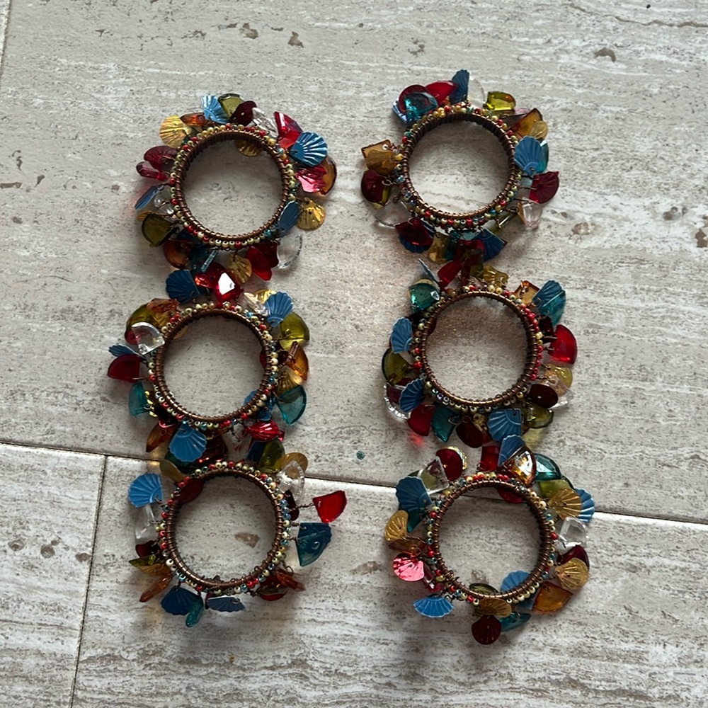 Set of six shell themed napkin rings